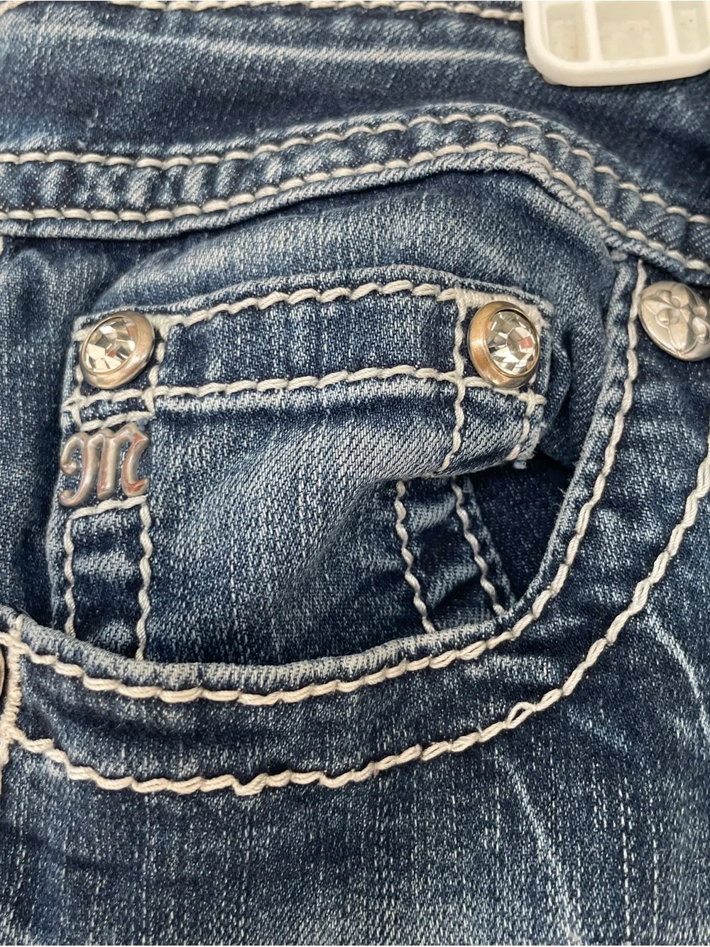 Miss Me Blue Flare Jeans with Contrast Stitching and bling back pockets.